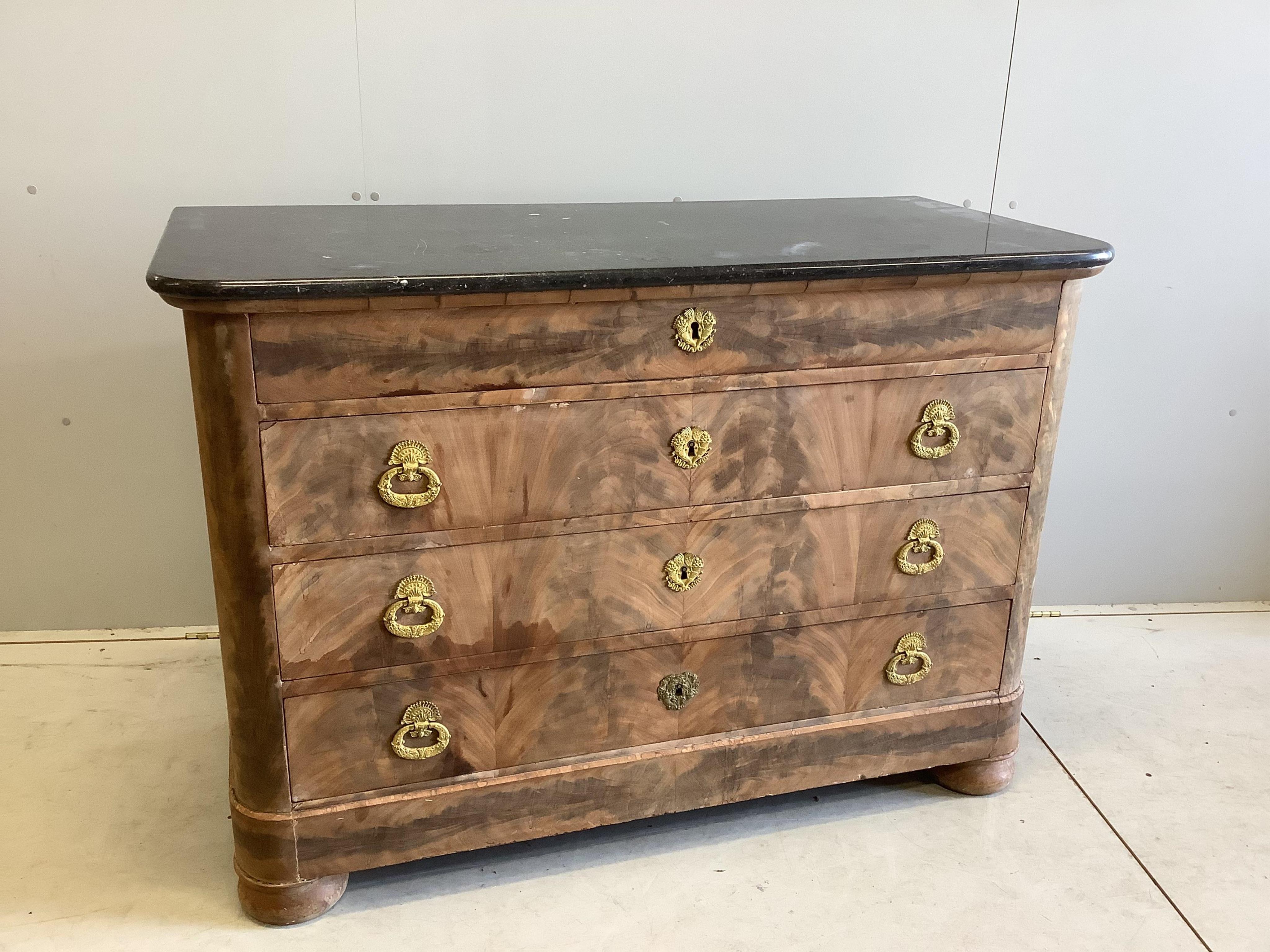 A 19th century French faded mahogany marble topped four drawer commode, width 130cm, depth 59cm, height 92cm. Condition - fair